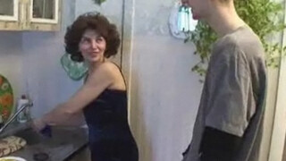 Mom sucked her sons dick in the kitchen